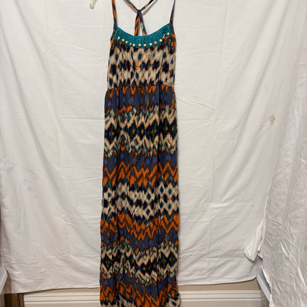 Bohemian-style maxi dress featuring a colorful chevron pattern